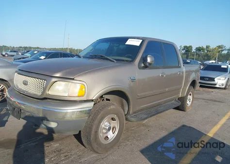 2001 Ford F150 Supercrew z USA, uszkodzony, nr VIN 1FTRW08L41KF96837